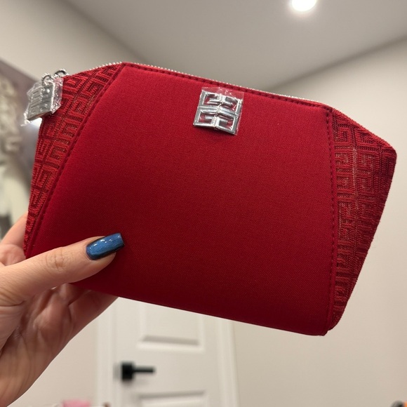 Givenchy Handbags - Givenchy red pouch